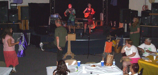 Cece and Me leading Worship at the "Gathering" at the Nite Light Cafe